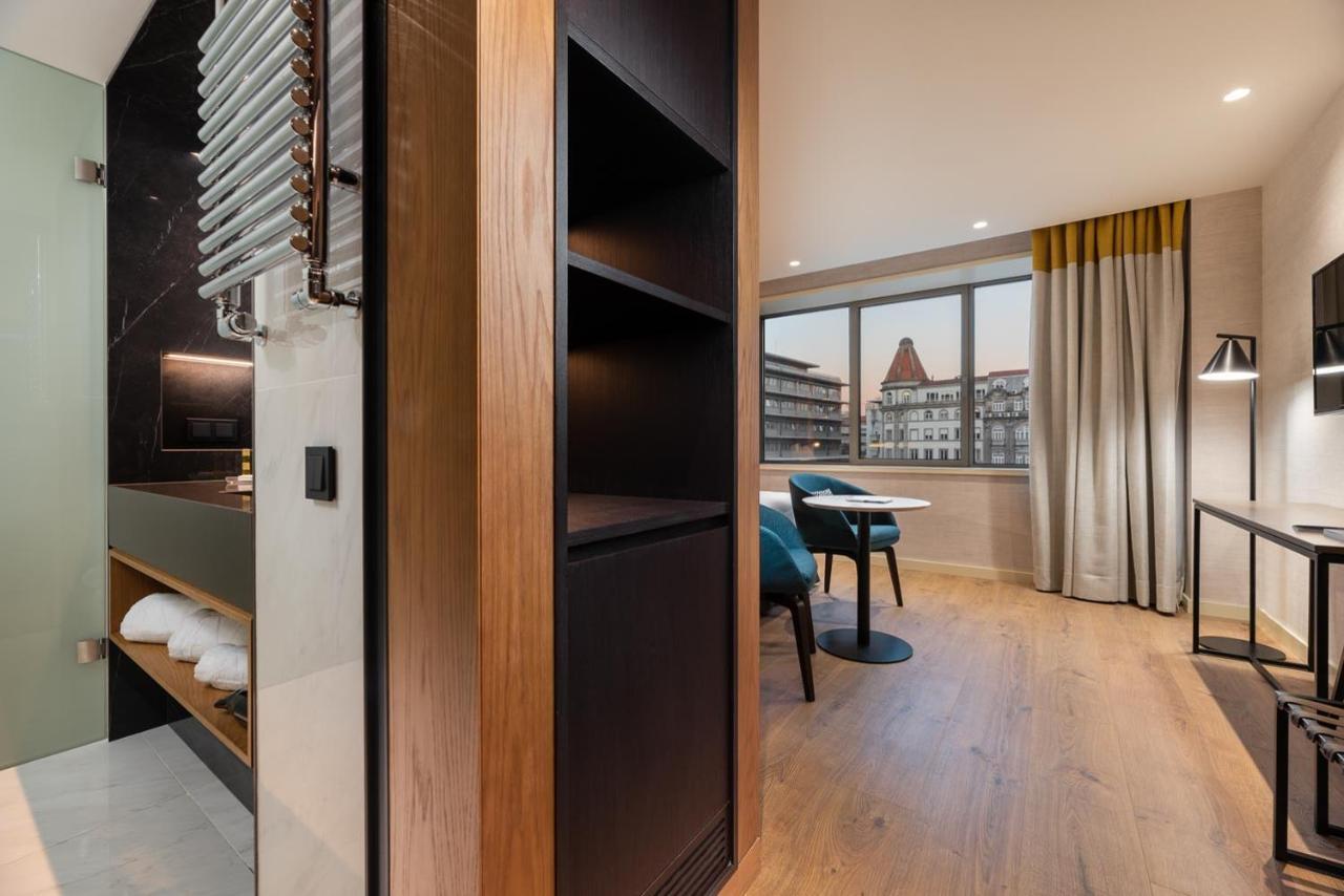Eurostars Aliados Hotel ปอร์โต ภายนอก รูปภาพ A room at the hotel
