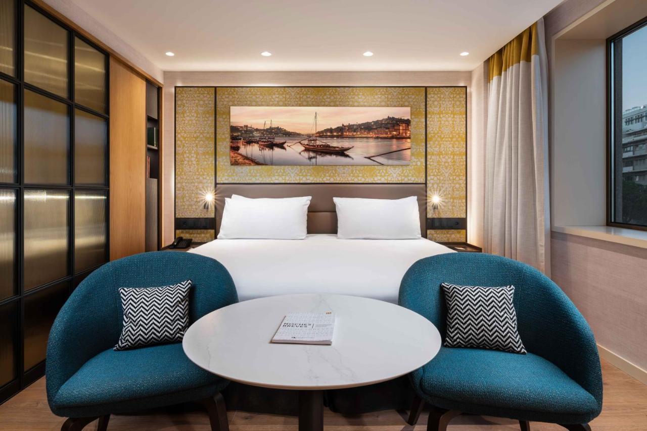 Eurostars Aliados Hotel ปอร์โต ภายนอก รูปภาพ A room at the hotel