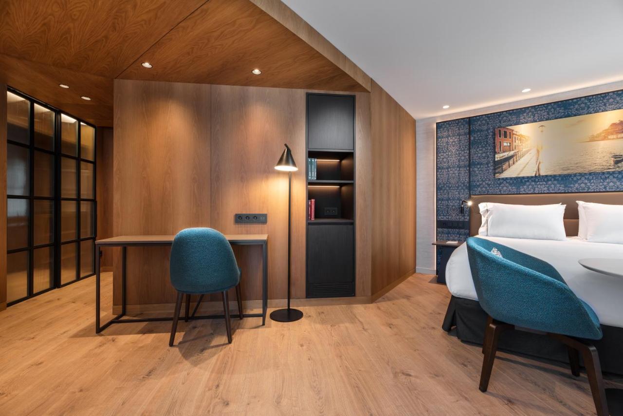 Eurostars Aliados Hotel ปอร์โต ภายนอก รูปภาพ A room at the hotel