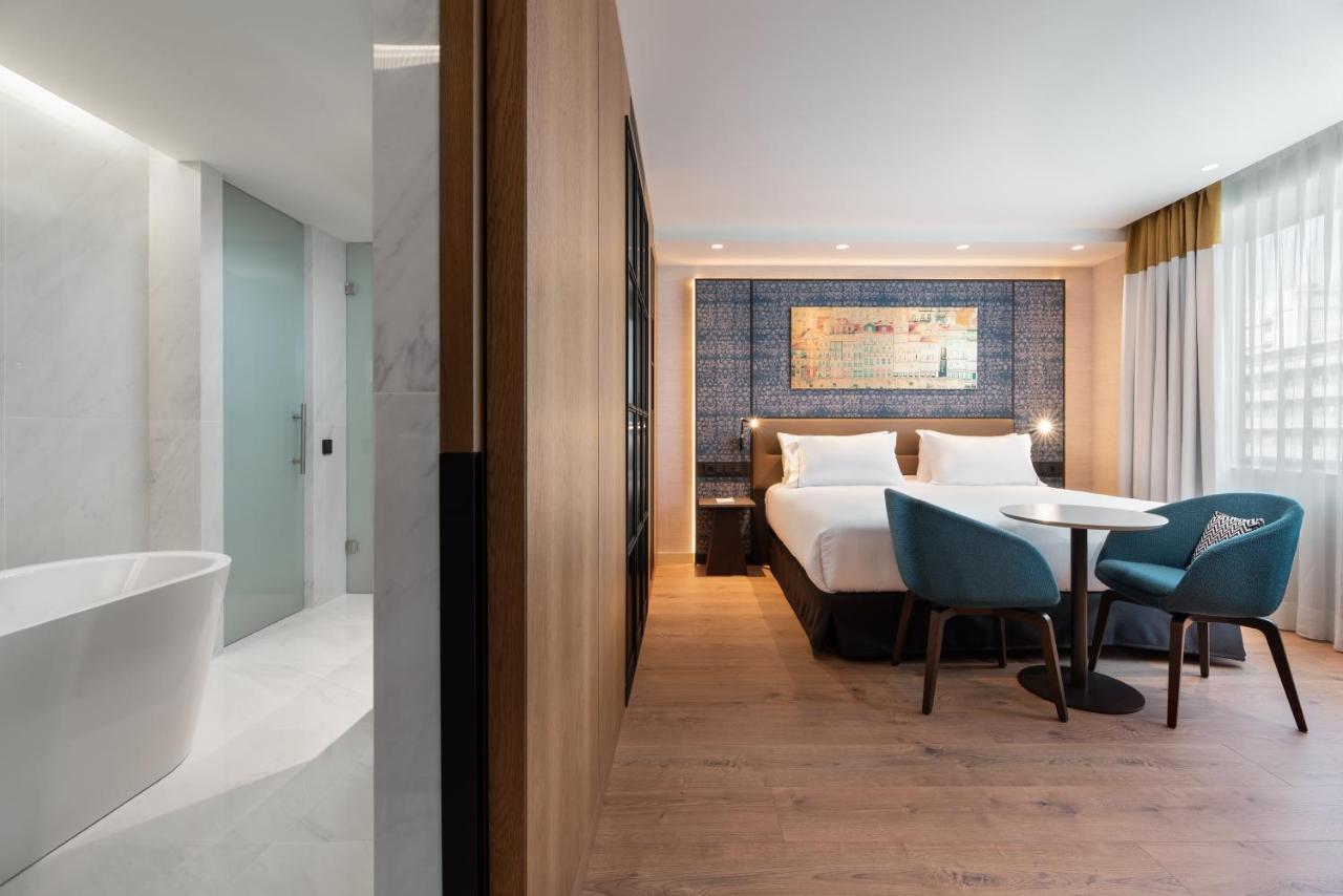 Eurostars Aliados Hotel ปอร์โต ภายนอก รูปภาพ A room at the hotel
