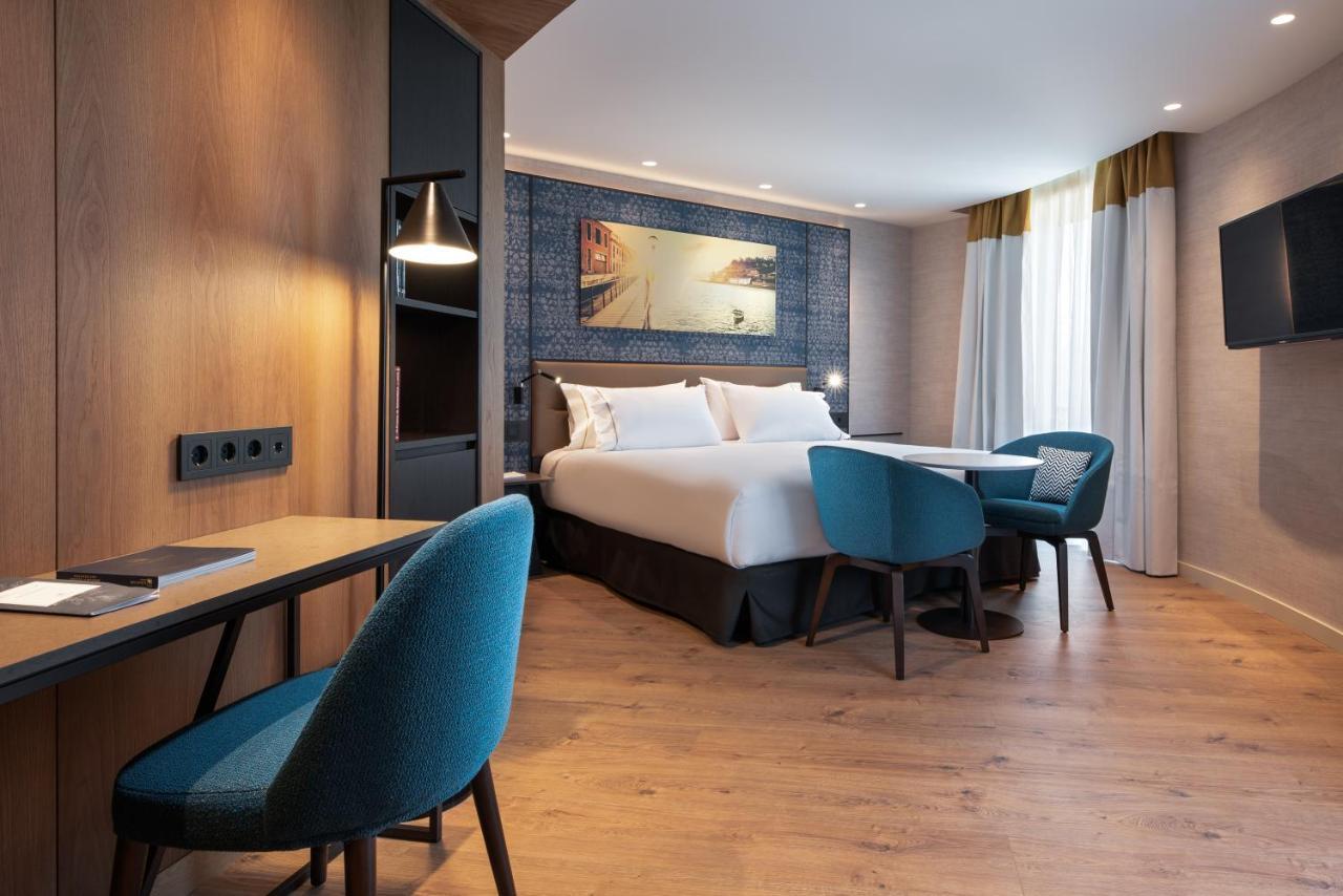 Eurostars Aliados Hotel ปอร์โต ภายนอก รูปภาพ A room at the hotel