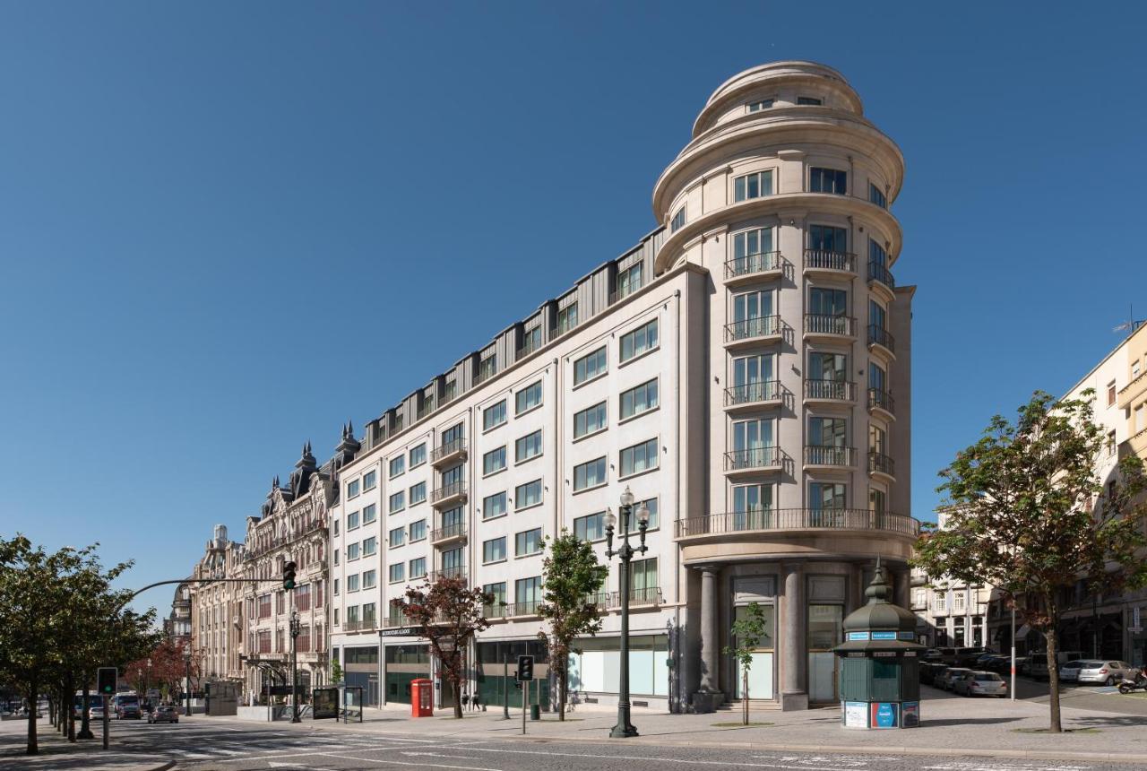Eurostars Aliados Hotel ปอร์โต ภายนอก รูปภาพ The former department store, now apartments