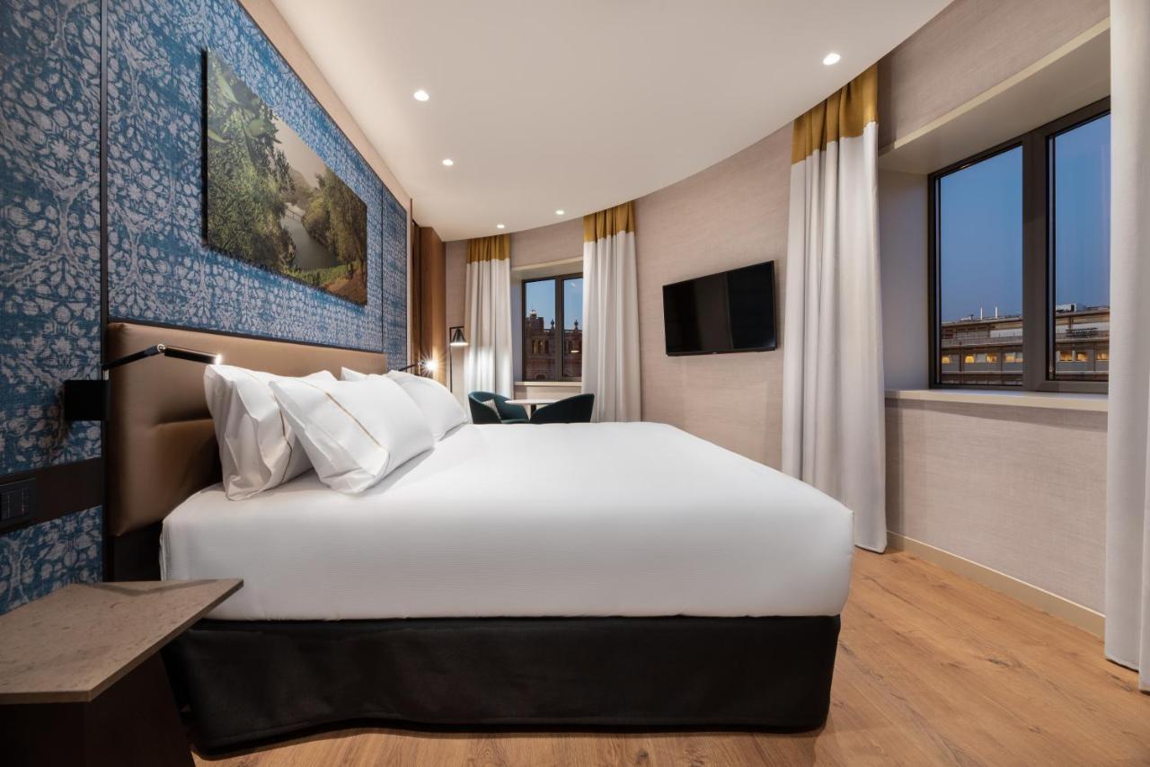 Eurostars Aliados Hotel ปอร์โต ภายนอก รูปภาพ A bedroom at the hotel