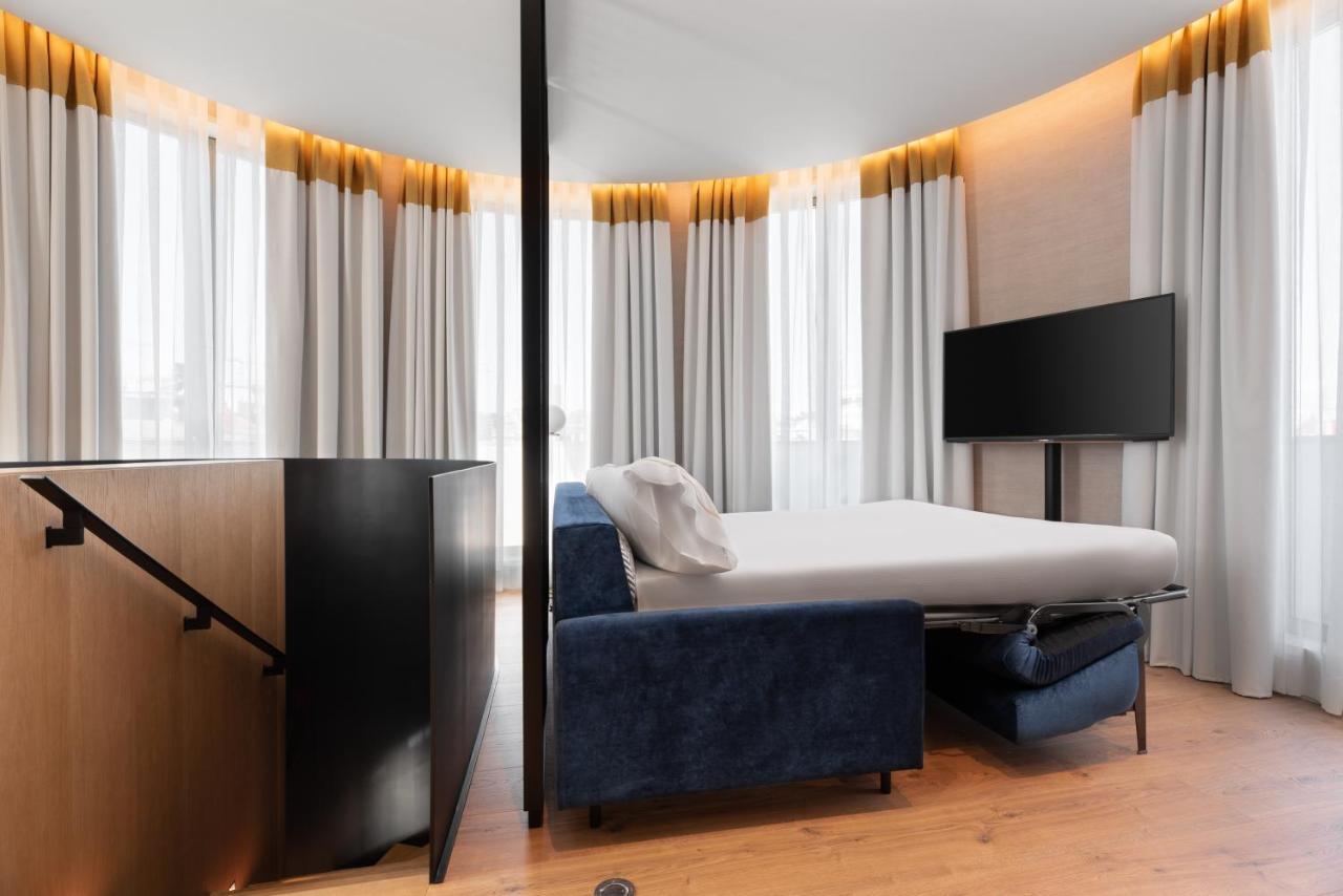 Eurostars Aliados Hotel ปอร์โต ภายนอก รูปภาพ A sofa bed