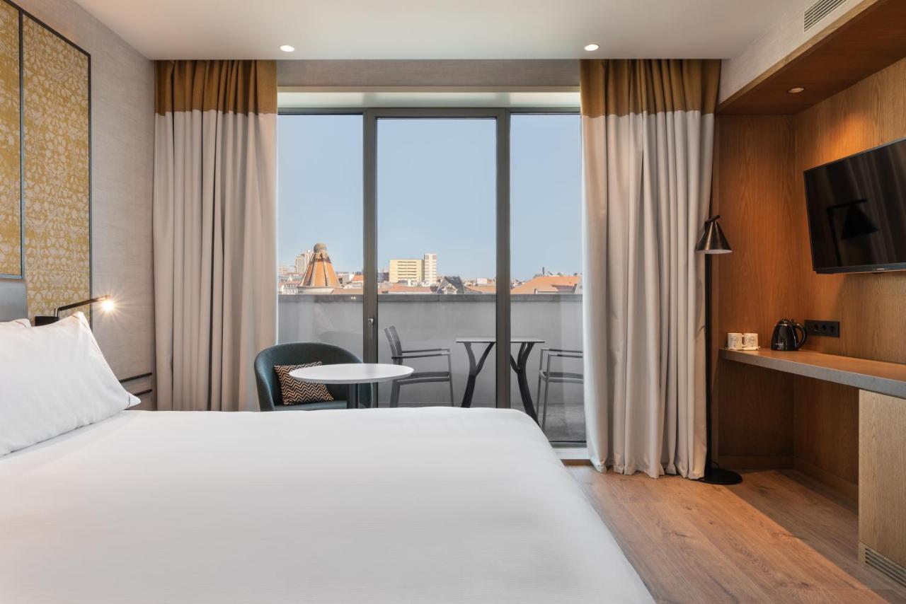 Eurostars Aliados Hotel ปอร์โต ภายนอก รูปภาพ Deluxe room with balcony