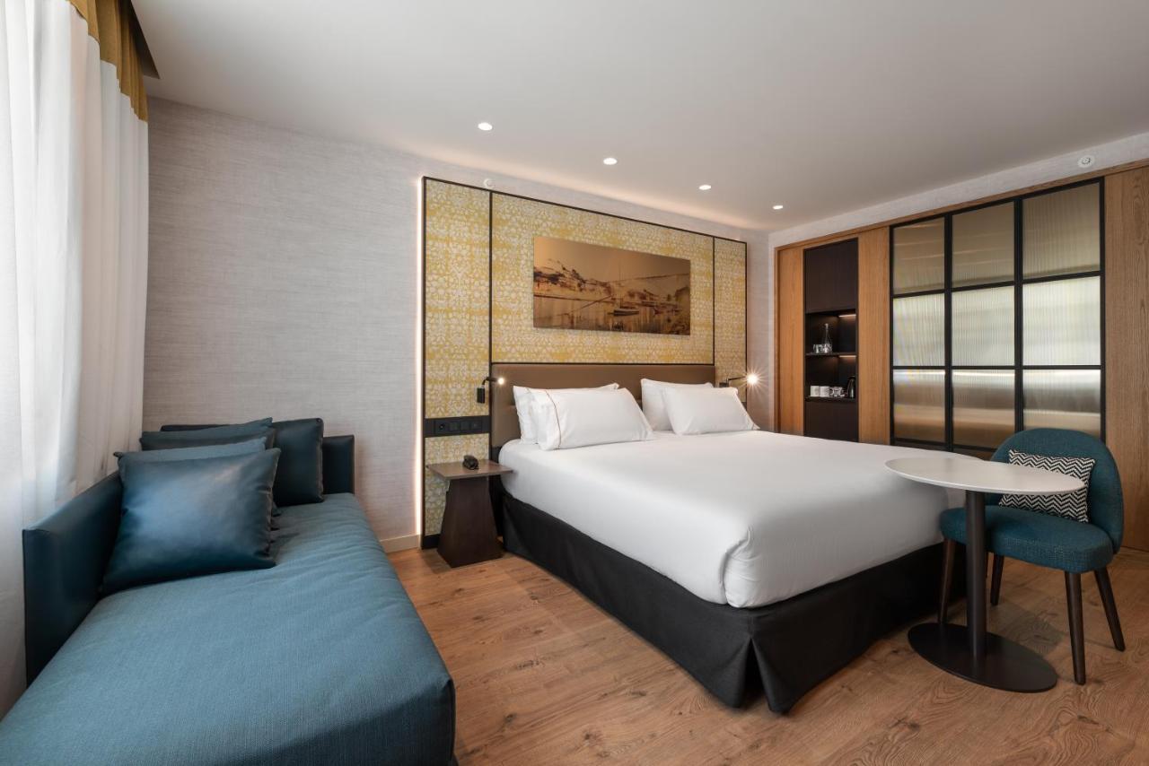 Eurostars Aliados Hotel ปอร์โต ภายนอก รูปภาพ A room at the hotel