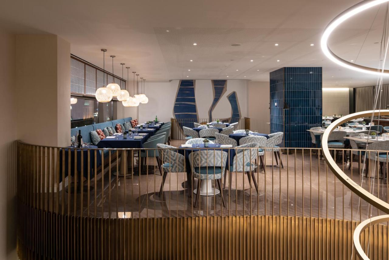 Eurostars Aliados Hotel ปอร์โต ภายนอก รูปภาพ The interior of the restaurant