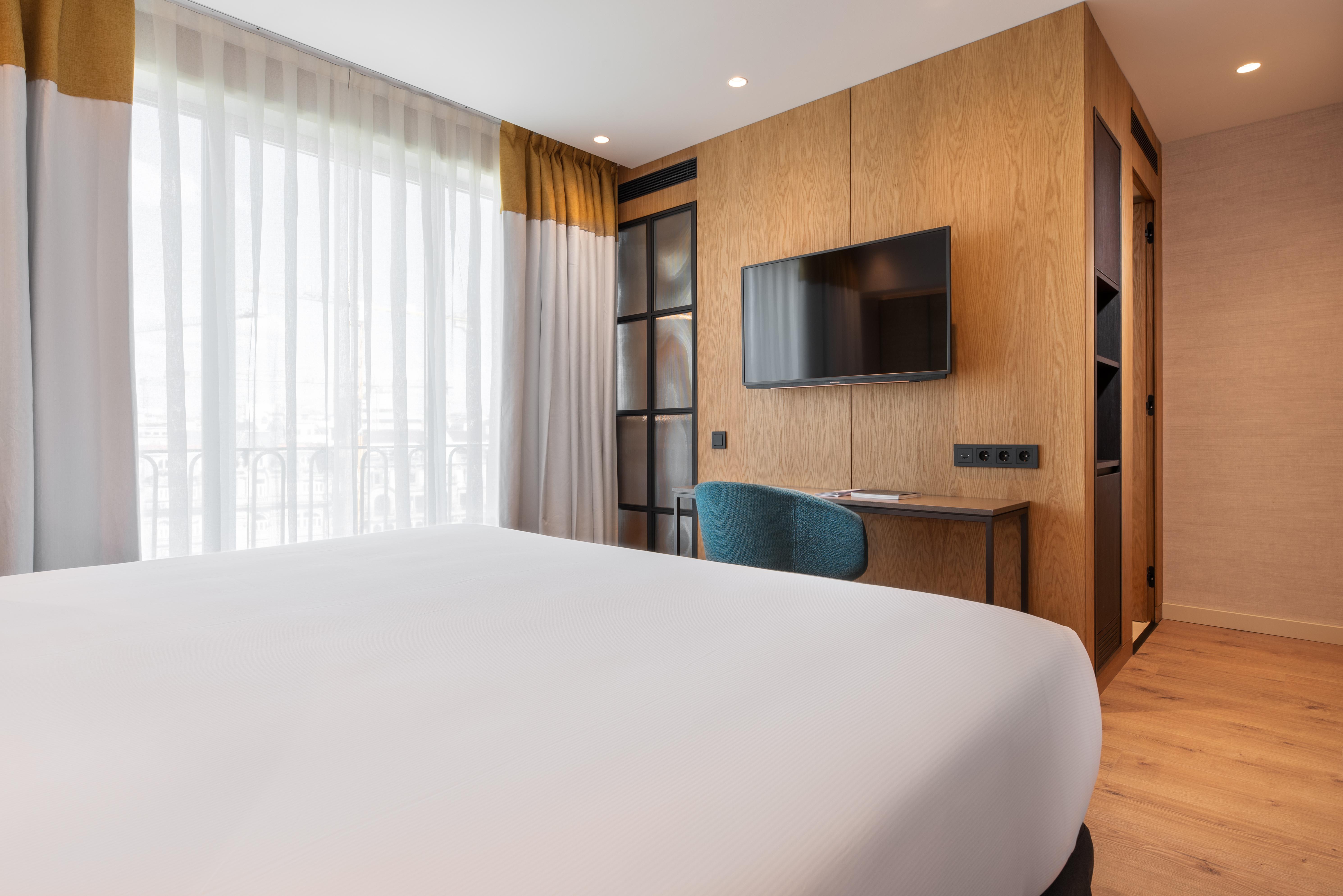 Eurostars Aliados Hotel ปอร์โต ภายนอก รูปภาพ A room at the hotel